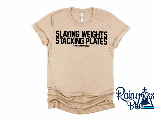 Slaying weights Stacking plates Barbell Club